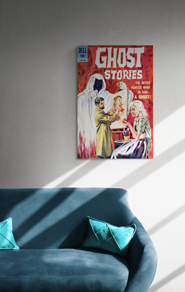 A large matte paper poster of the cover of the 1963 comic book "Ghost Stories #4", partially obscured by shadow, hung on a gun-smoke grey wall above a blue couch