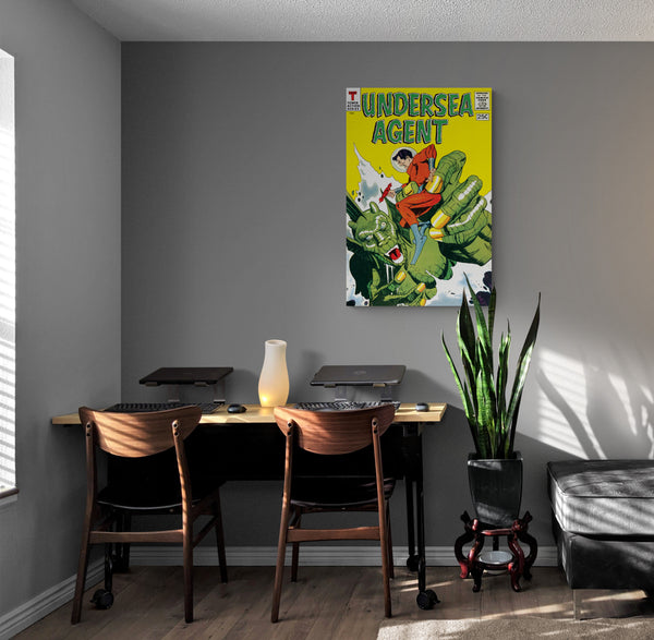 A large matte paper poster of the cover of the 1966 comic book "Undersea Agent #4" hung in a modern den containing a wooden desk with computer equipment