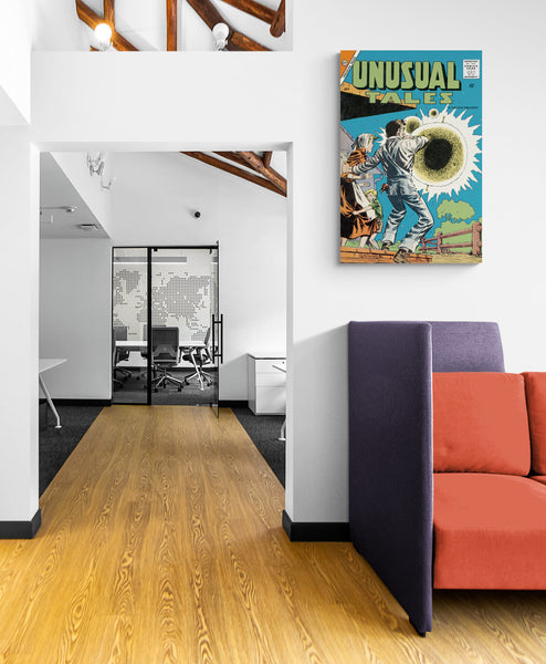 A large matte paper poster of the cover of the 1958 comic book "Unusual Tales #12" hung in a meeting room of a large modern office above a purple and orange sofa