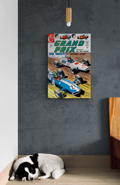 A large matte paper poster of the cover of the 1967 comic book "Grand Prix #16" in the common room of a modern office hung on a concrete wall with a dog napping below it