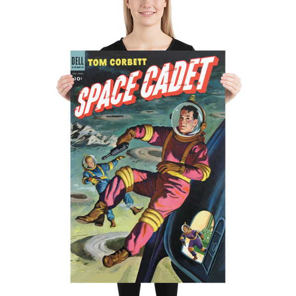 A large matte paper poster of the cover of the 1954 comic book "Space Cadet #9" being held up by a young woman